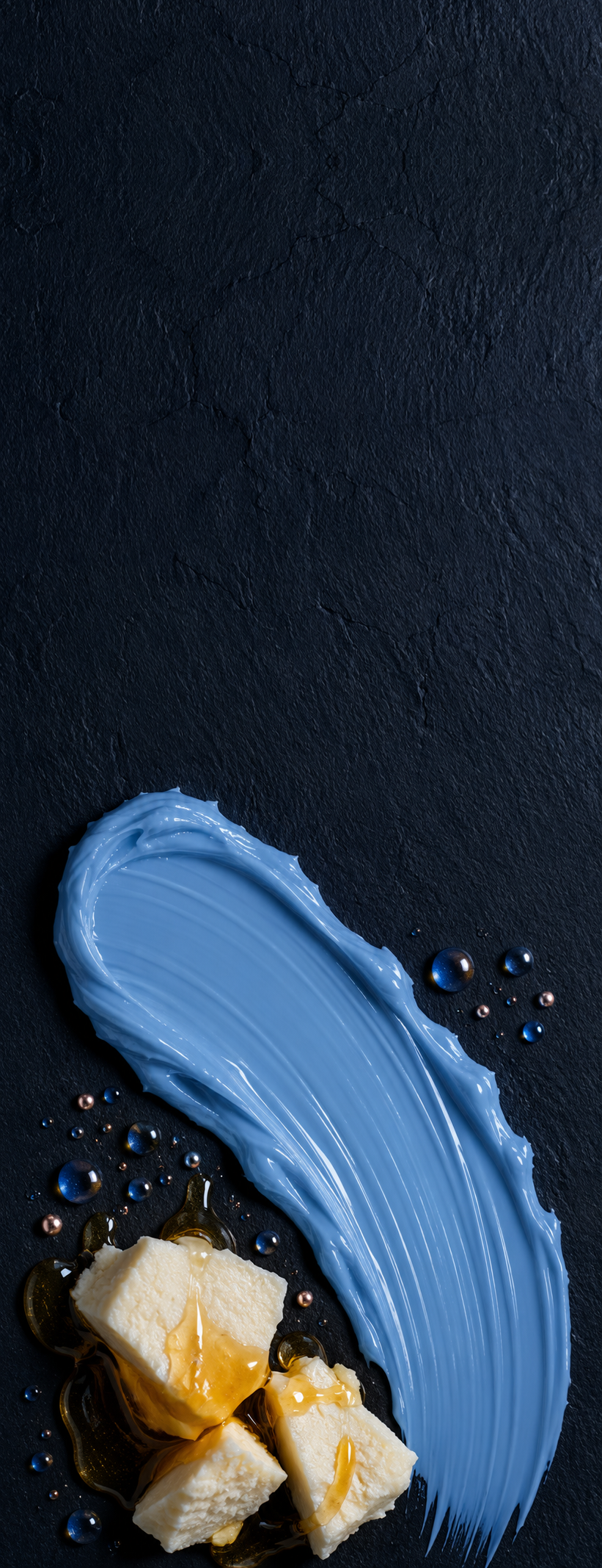 Periwinkle balm smear with grass-fed tallow and raw honey on slate